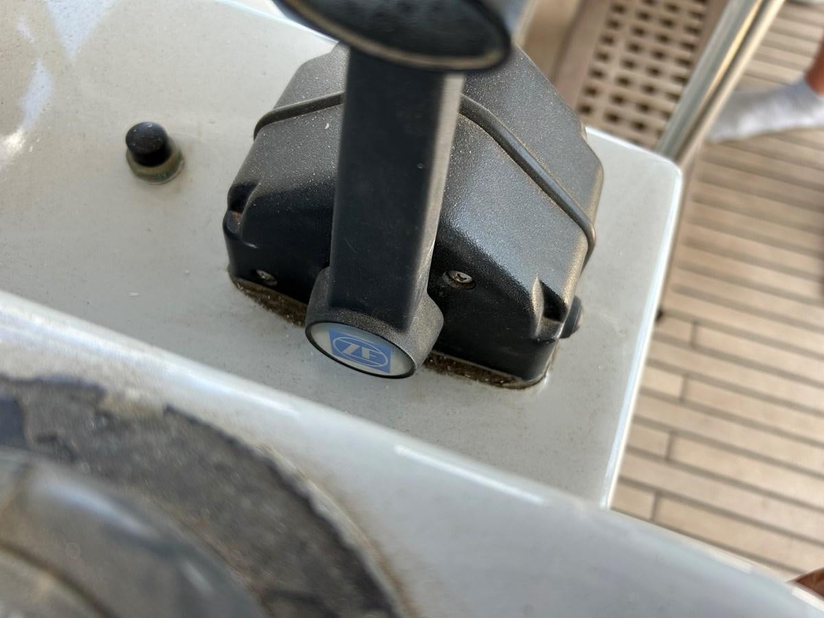 a black car seat aboard MOTORSAILLOR Yacht for Sale