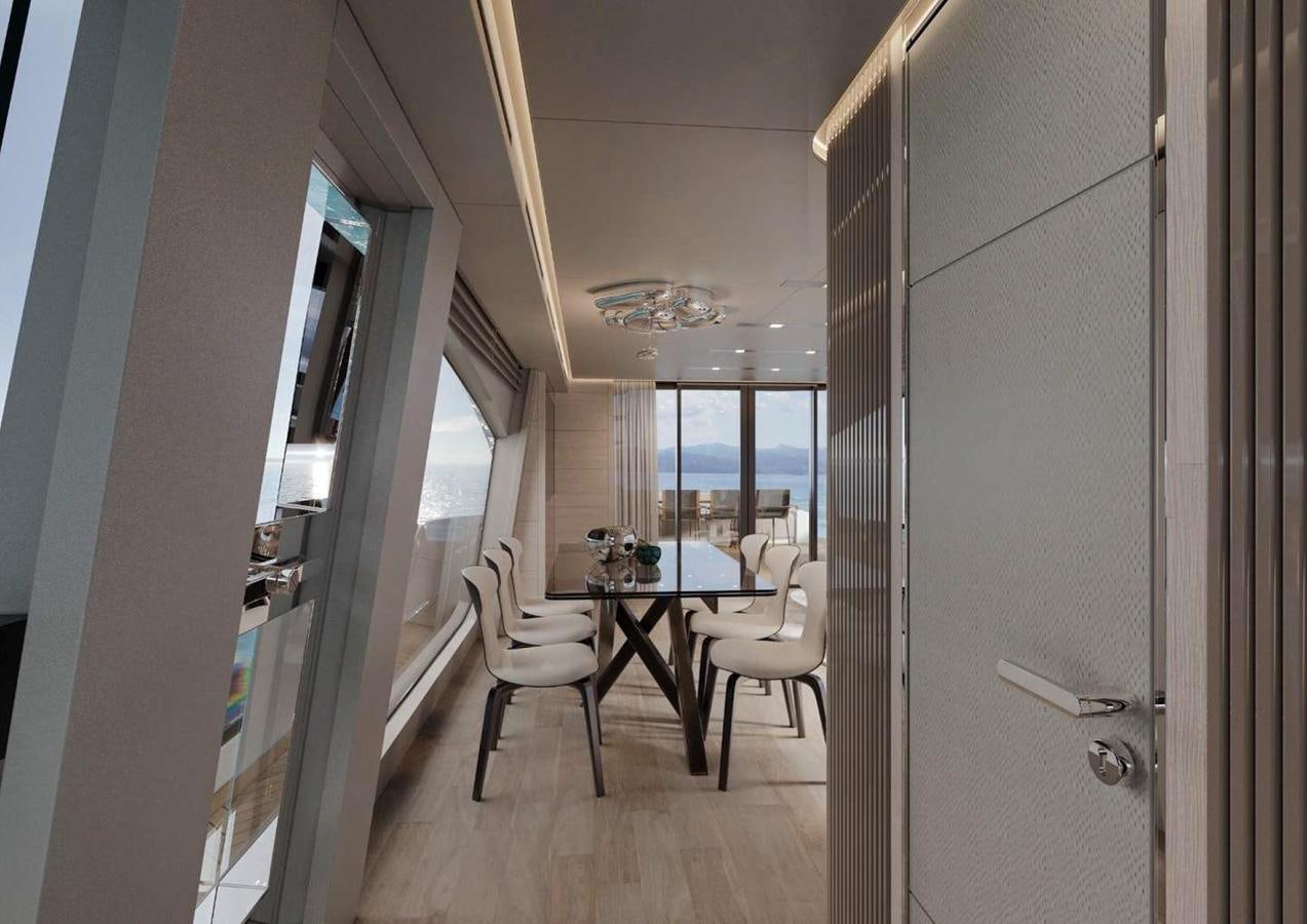 a room with a table and chairs aboard AB80 Yacht for Sale