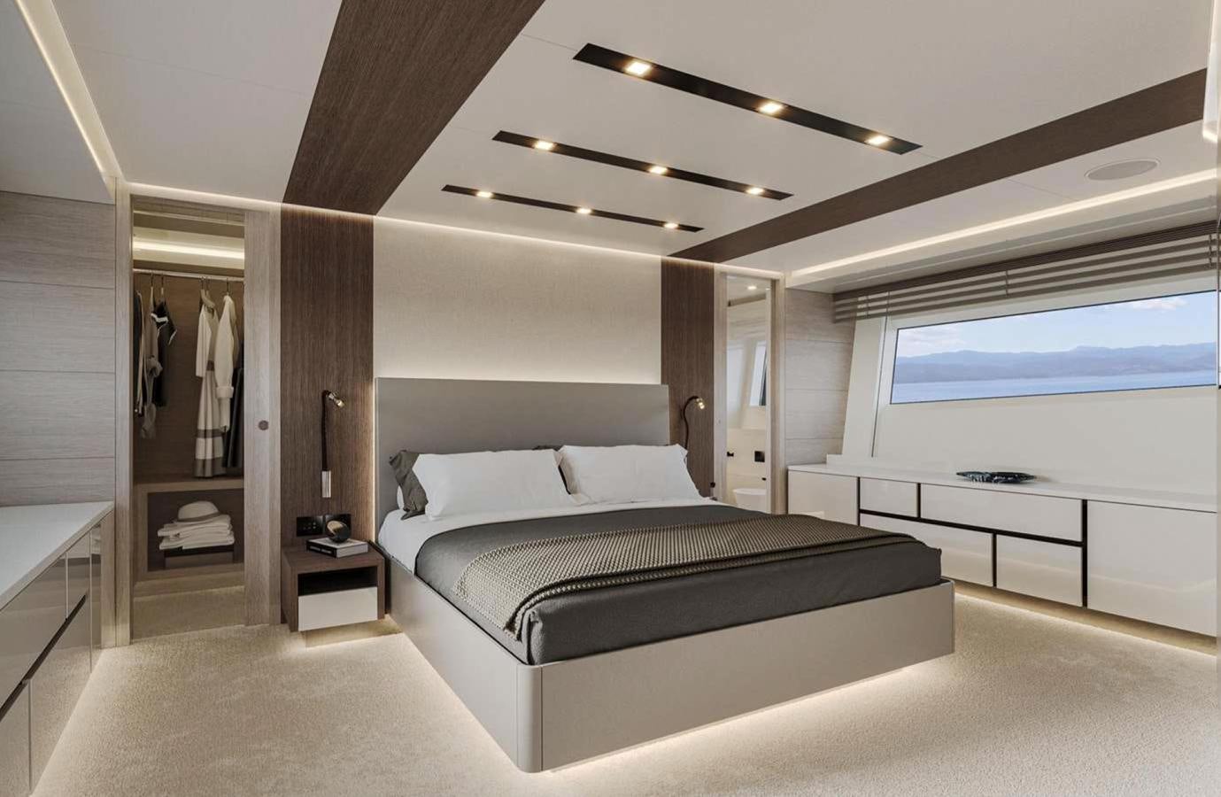a large bedroom with a large bed aboard AB80 Yacht for Sale