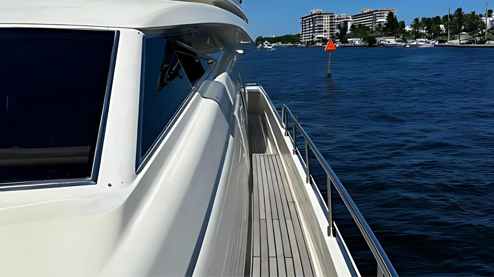 a boat on the water aboard 1998 FERRETTI 80FT Yacht for Sale