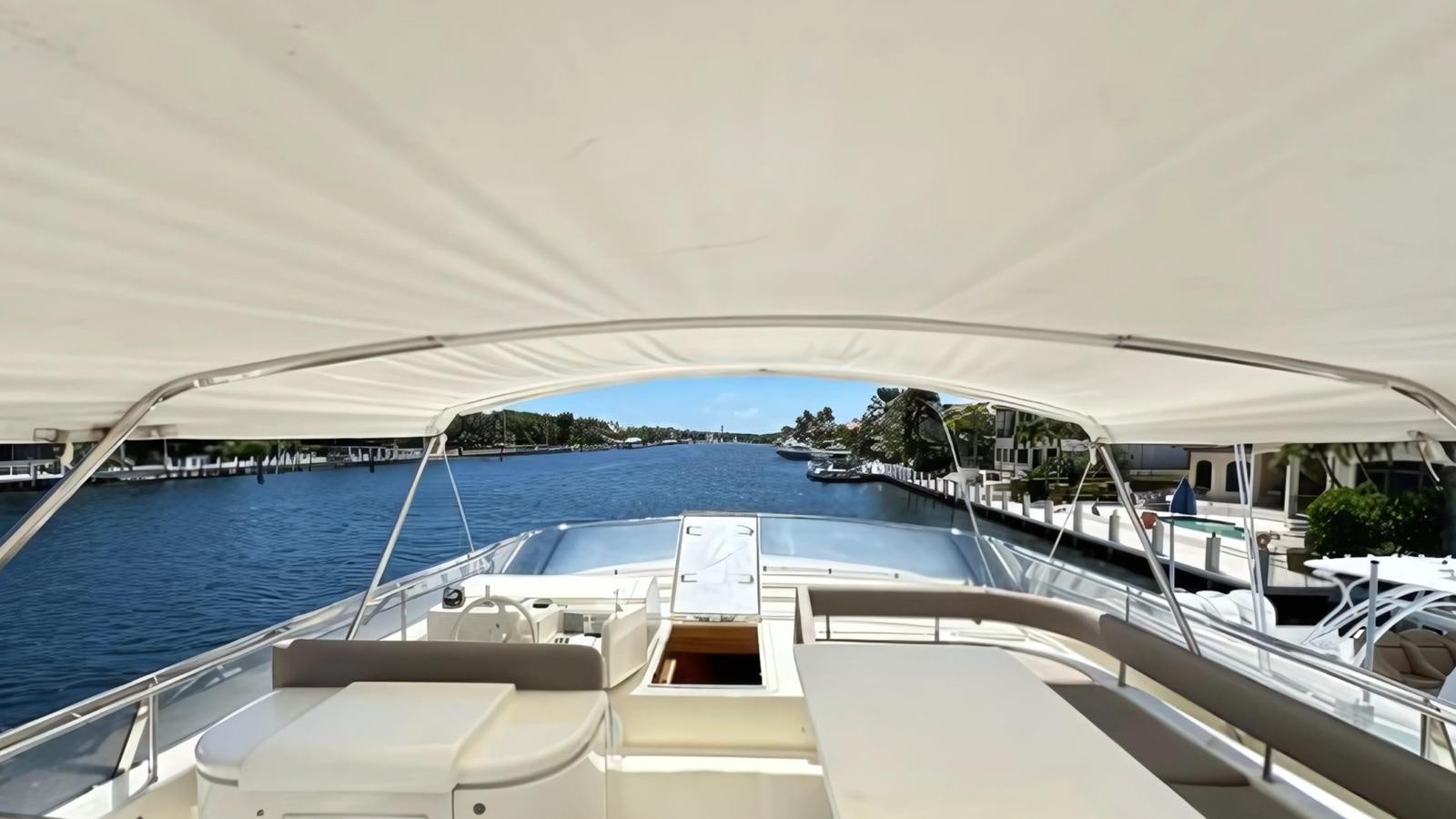 a boat on the water aboard 1998 FERRETTI 80FT Yacht for Sale