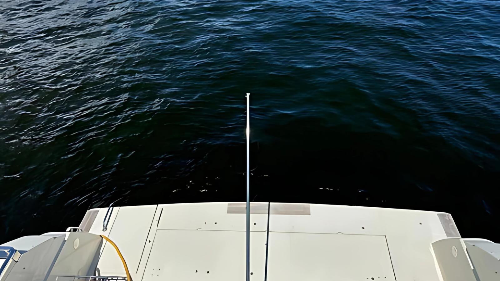 a boat in the water aboard 1998 FERRETTI 80FT Yacht for Sale