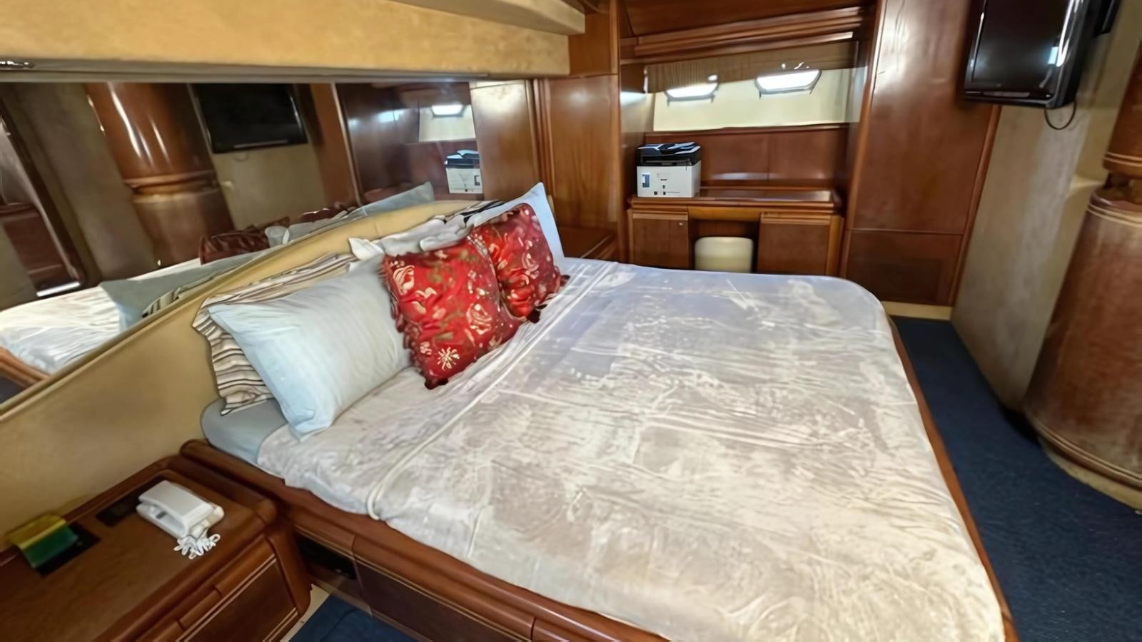 a bed with white sheets aboard 1998 FERRETTI 80FT Yacht for Sale