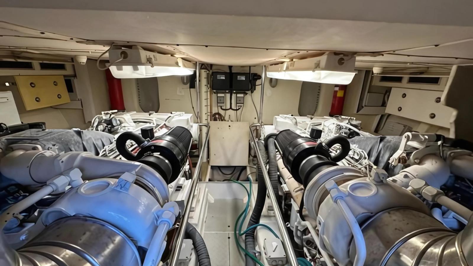 a room full of cars aboard 1998 FERRETTI 80FT Yacht for Sale