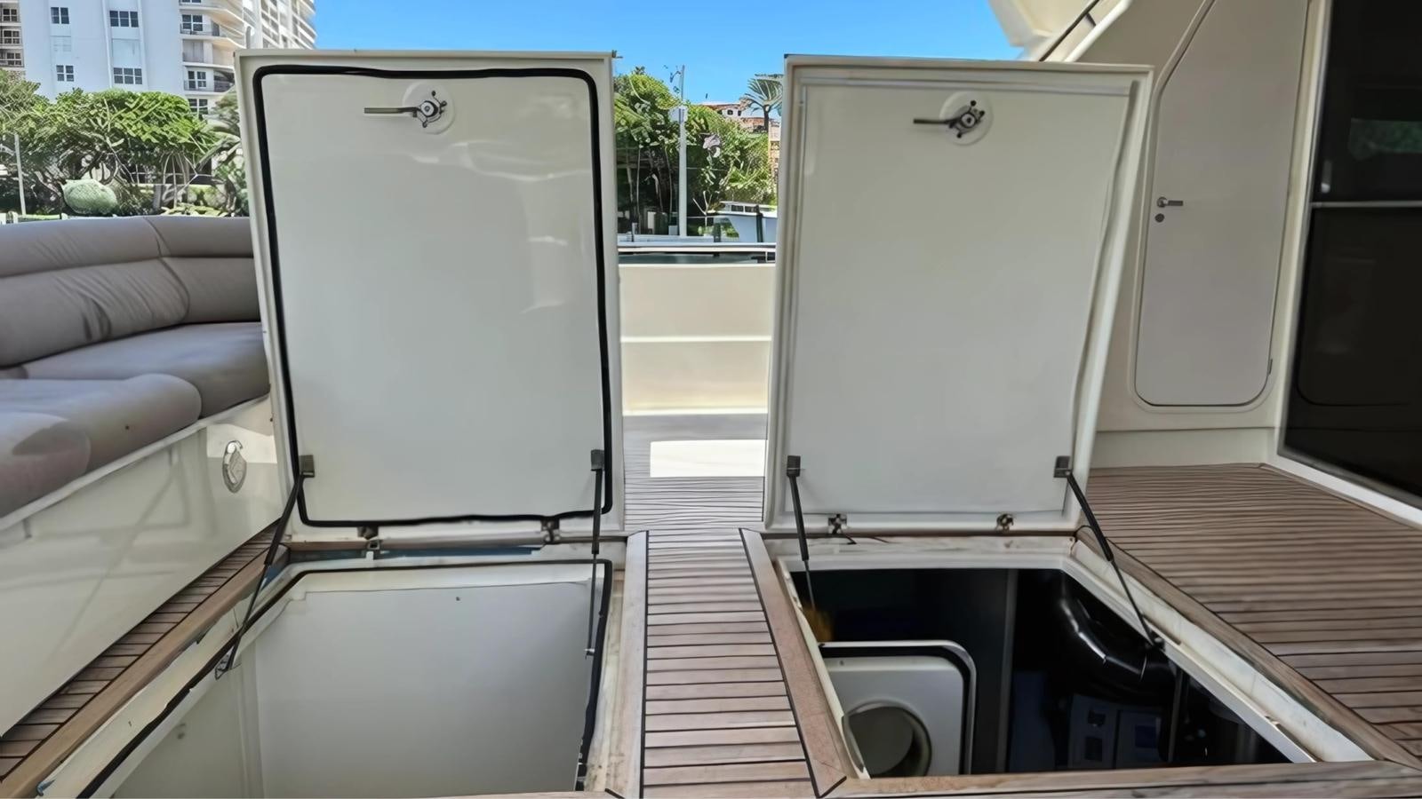 a large white box on a boat aboard 1998 FERRETTI 80FT Yacht for Sale