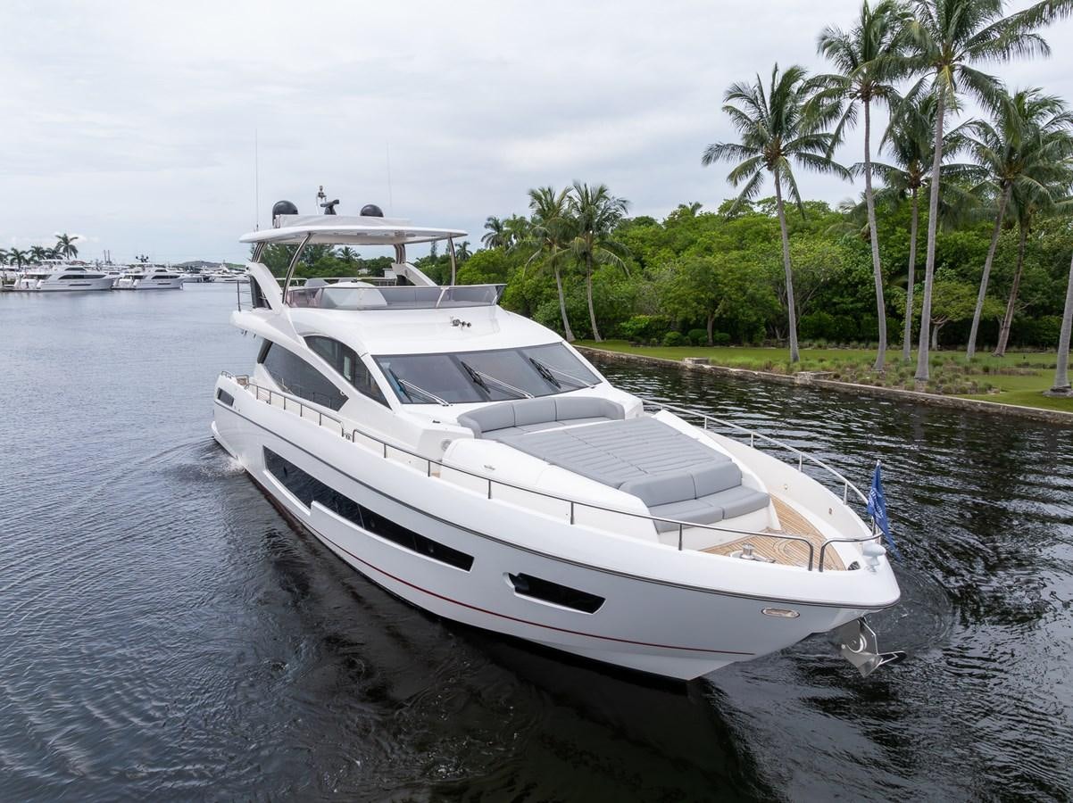 a white boat on the water aboard 2018 SUNSEEKER 75 YACHT Yacht for Sale