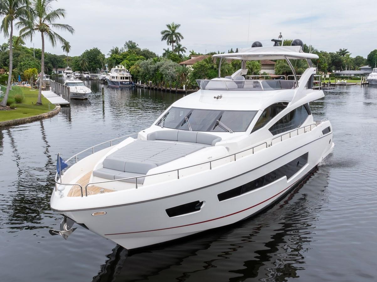 a boat in a harbor aboard 2018 SUNSEEKER 75 YACHT Yacht for Sale