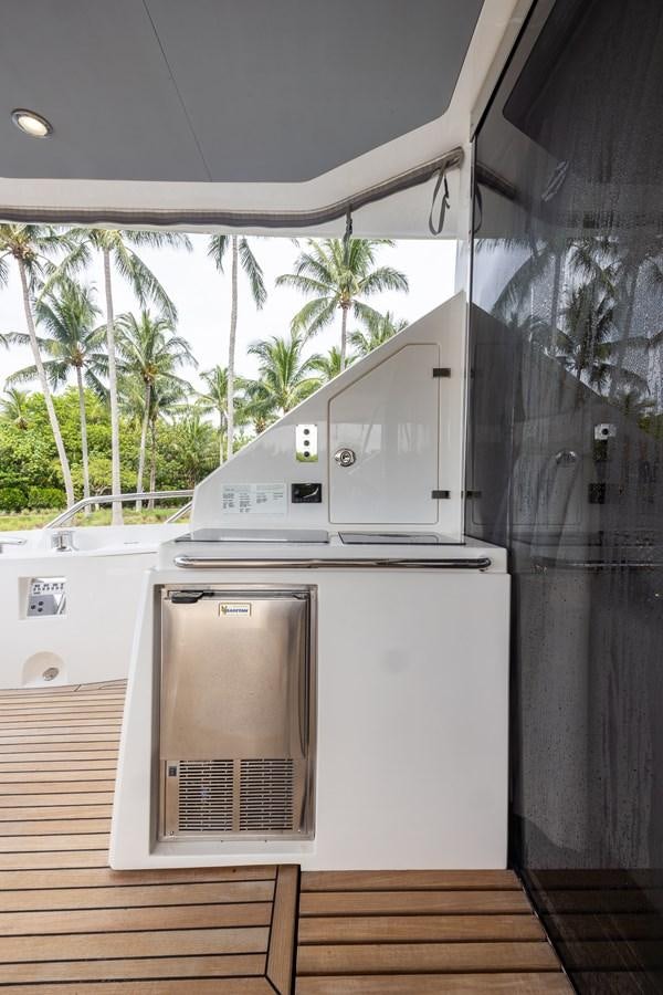 a kitchen with a refrigerator aboard 2018 SUNSEEKER 75 YACHT Yacht for Sale