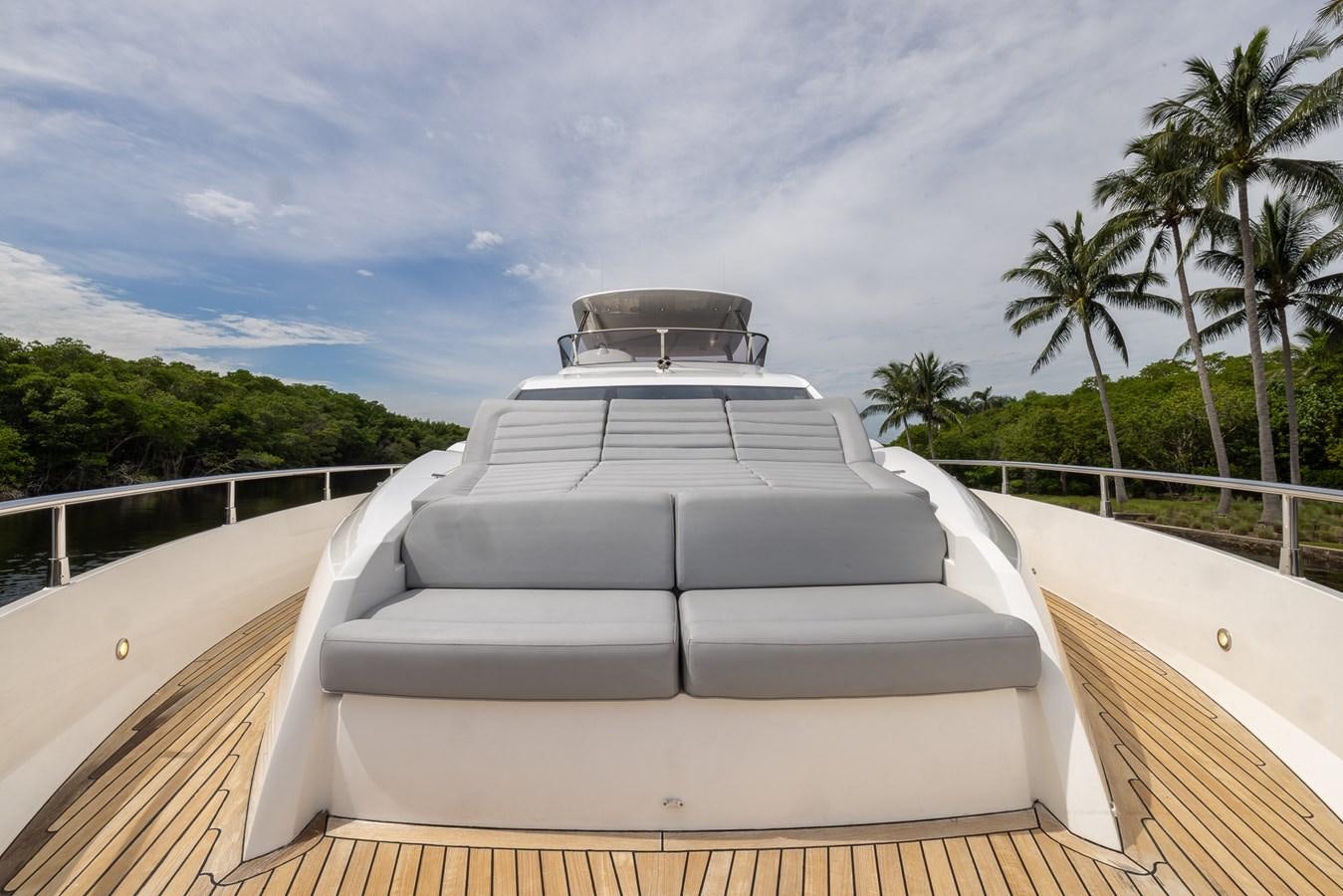 a white car on a wooden deck aboard 2018 SUNSEEKER 75 YACHT Yacht for Sale