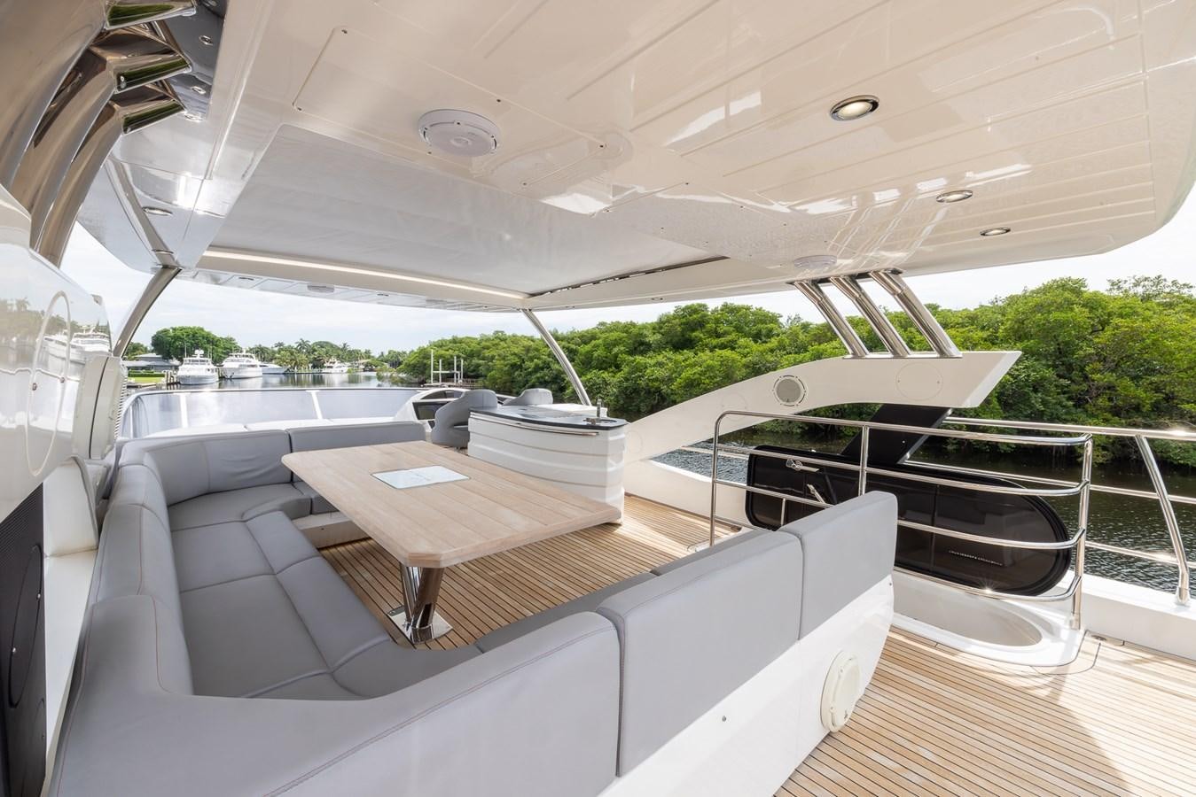 a large white tent with a table and chairs aboard 2018 SUNSEEKER 75 YACHT Yacht for Sale