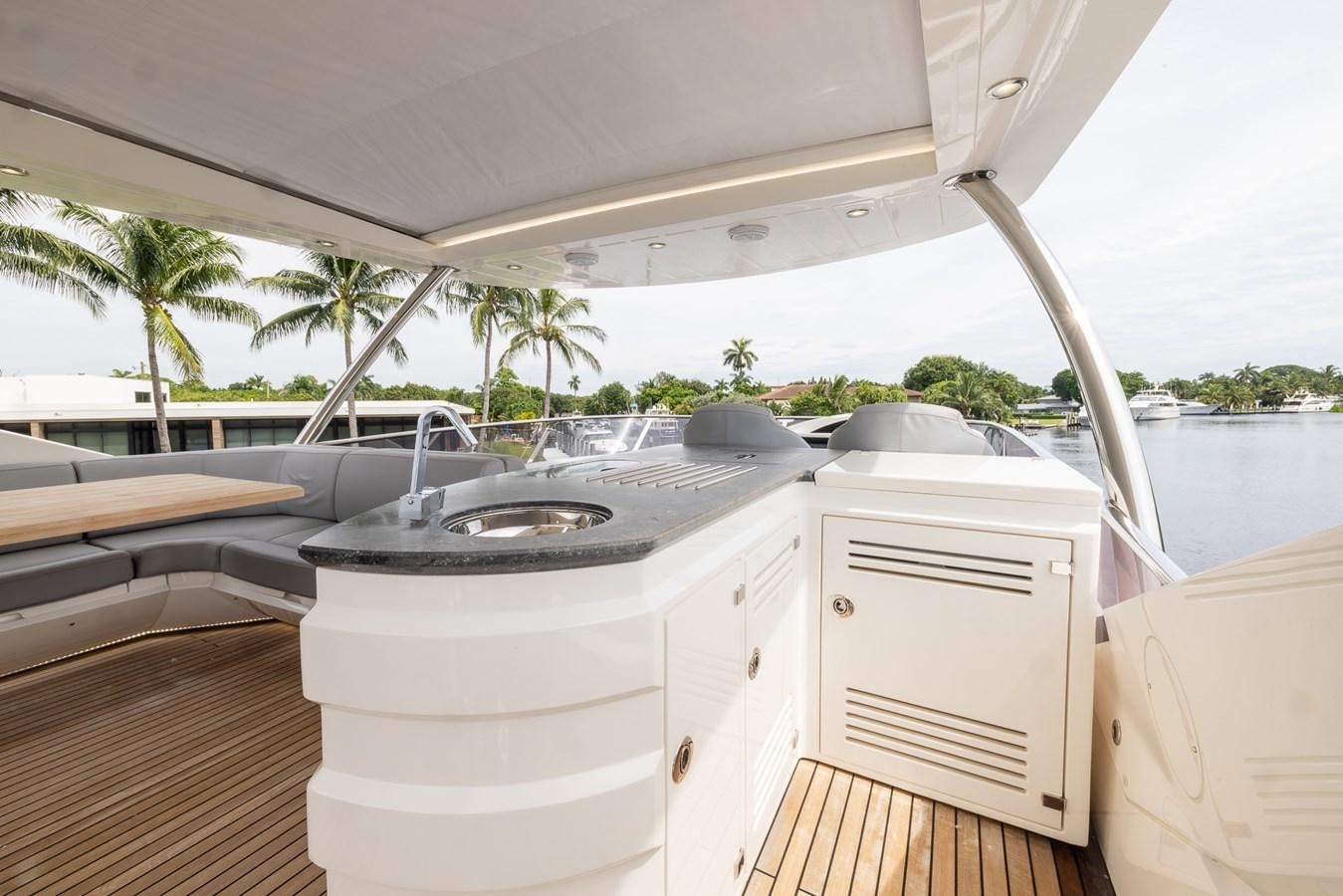 a boat with a sink and a grill on the deck aboard 2018 SUNSEEKER 75 YACHT Yacht for Sale