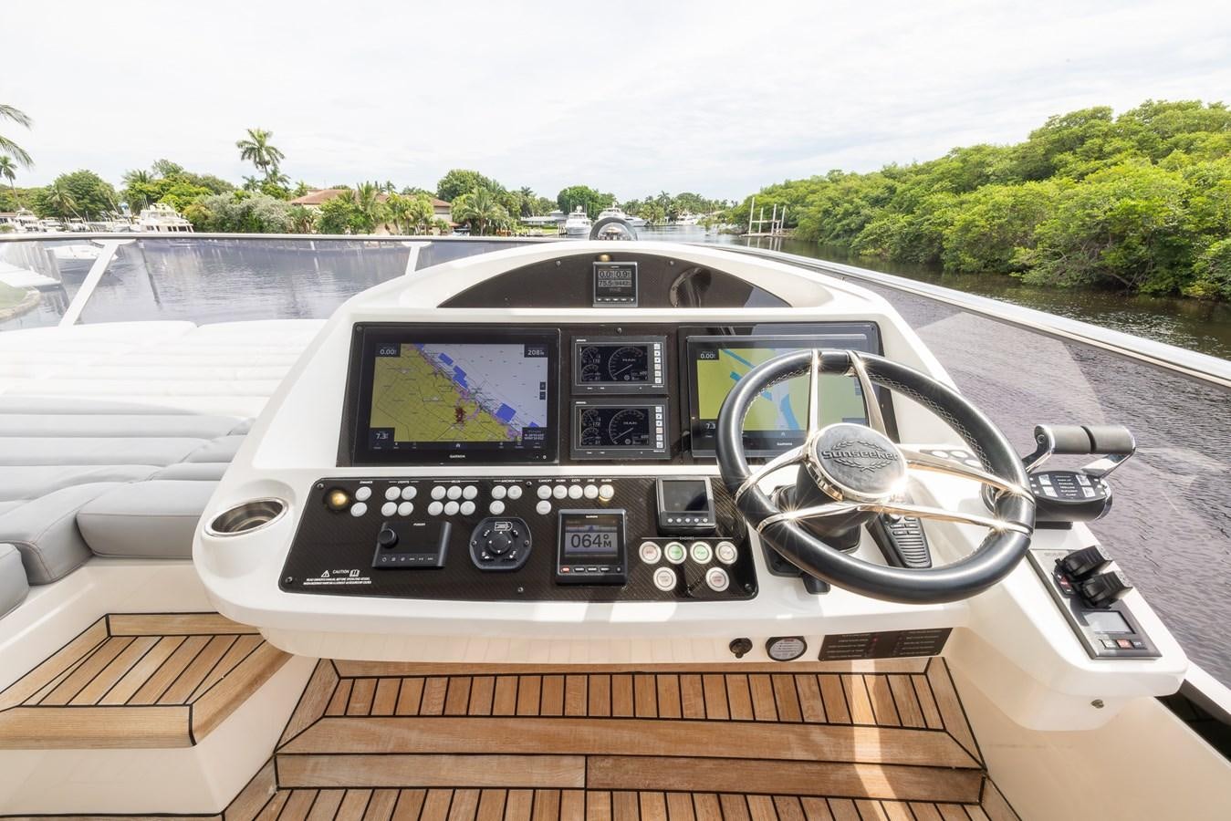 a car driving on a road aboard 2018 SUNSEEKER 75 YACHT Yacht for Sale