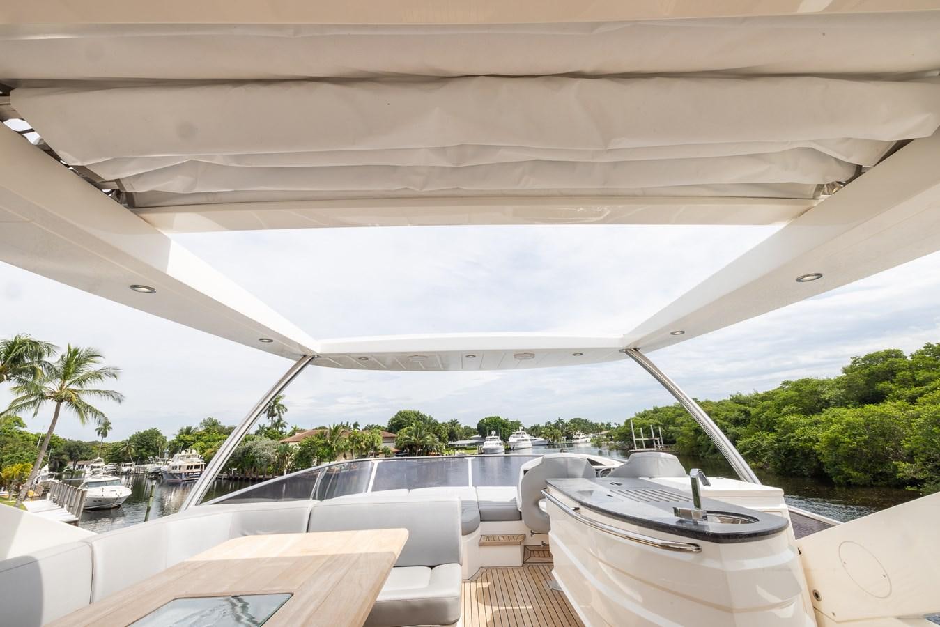 a large white building with a pool aboard 2018 SUNSEEKER 75 YACHT Yacht for Sale