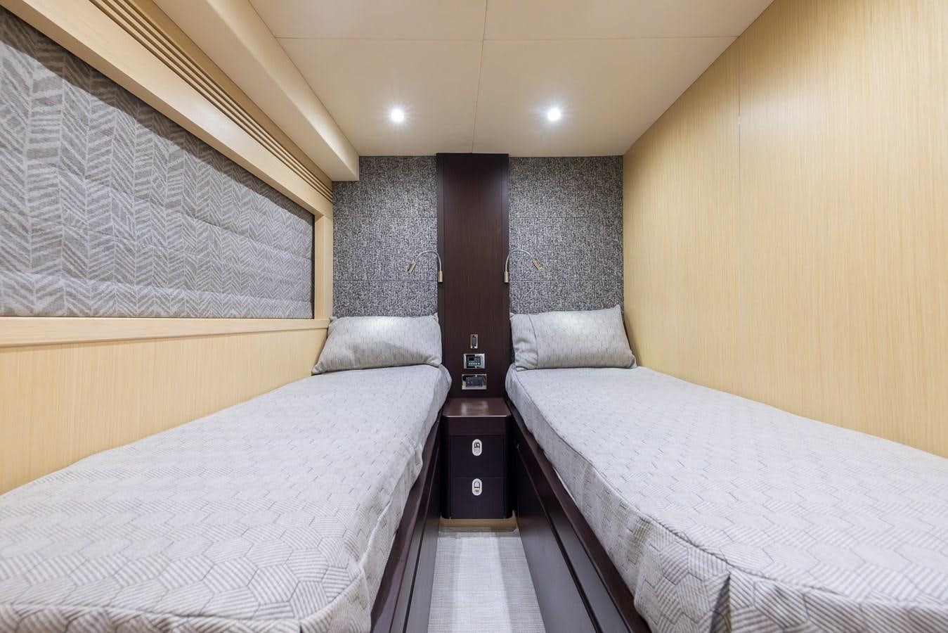 a couple of beds in a room aboard 2018 SUNSEEKER 75 YACHT Yacht for Sale