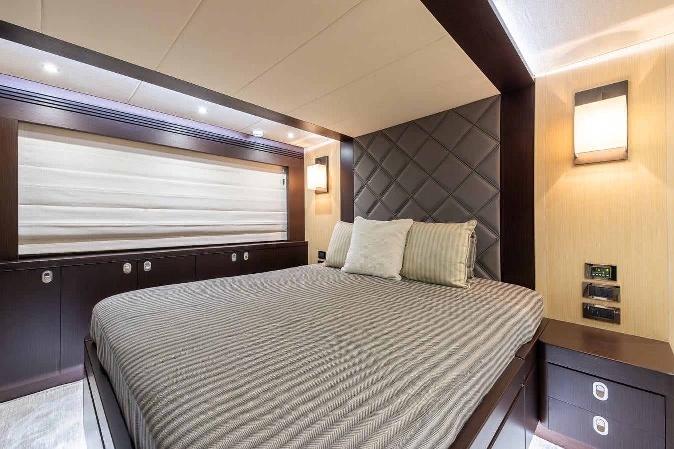 a bed with a white sheet aboard 2018 SUNSEEKER 75 YACHT Yacht for Sale