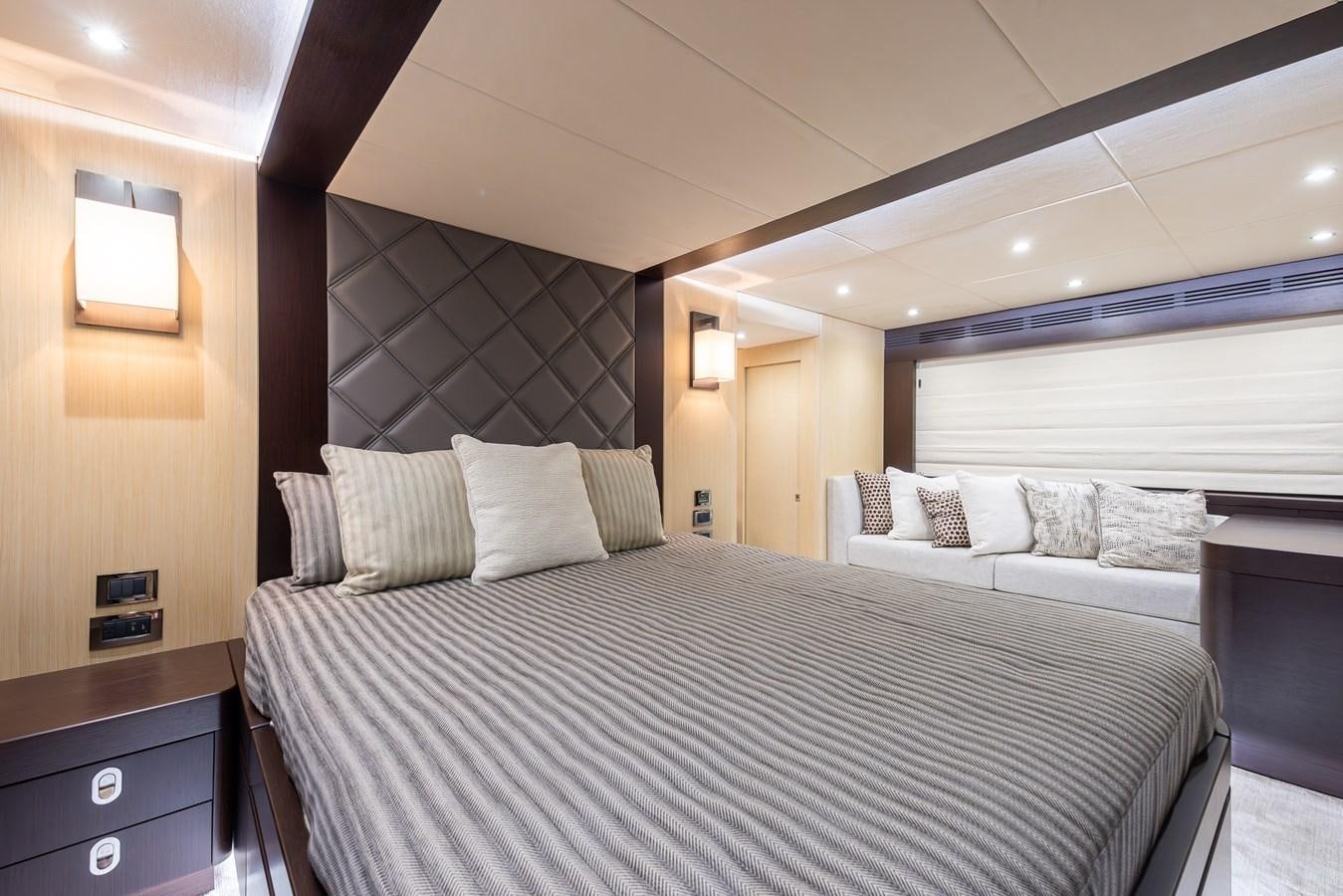 a bedroom with two beds aboard 2018 SUNSEEKER 75 YACHT Yacht for Sale