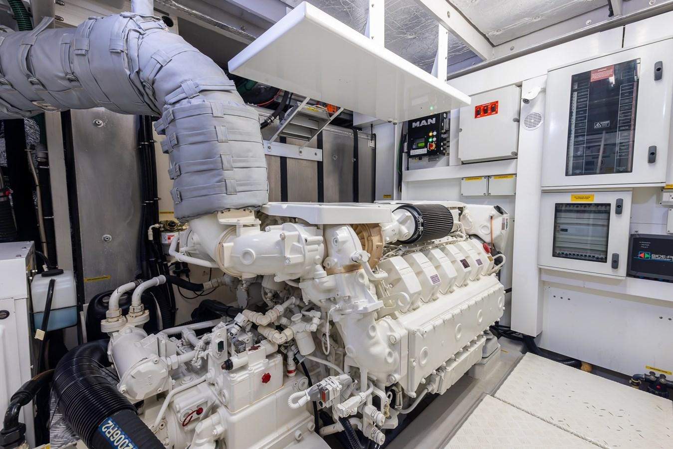 a machine with a large amount of equipment in it aboard 2018 SUNSEEKER 75 YACHT Yacht for Sale