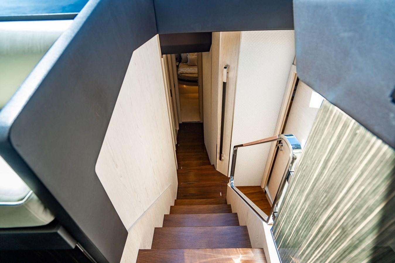 a long hallway with a door aboard THE PERFECT MERITAGE Yacht for Sale