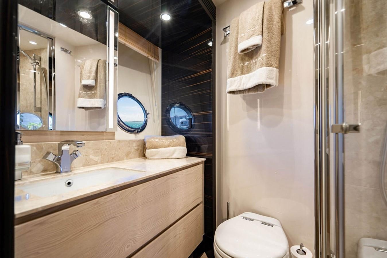 a bathroom with a sink and a toilet aboard THE PERFECT MERITAGE Yacht for Sale