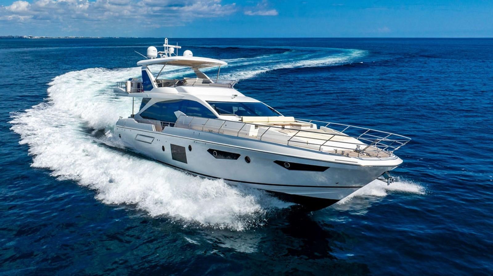 a white yacht on the water aboard THE PERFECT MERITAGE Yacht for Sale