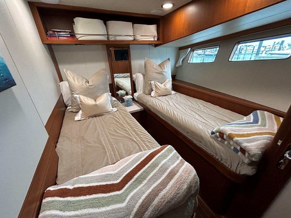 a couple of beds in a room aboard NOVIA II Yacht for Sale