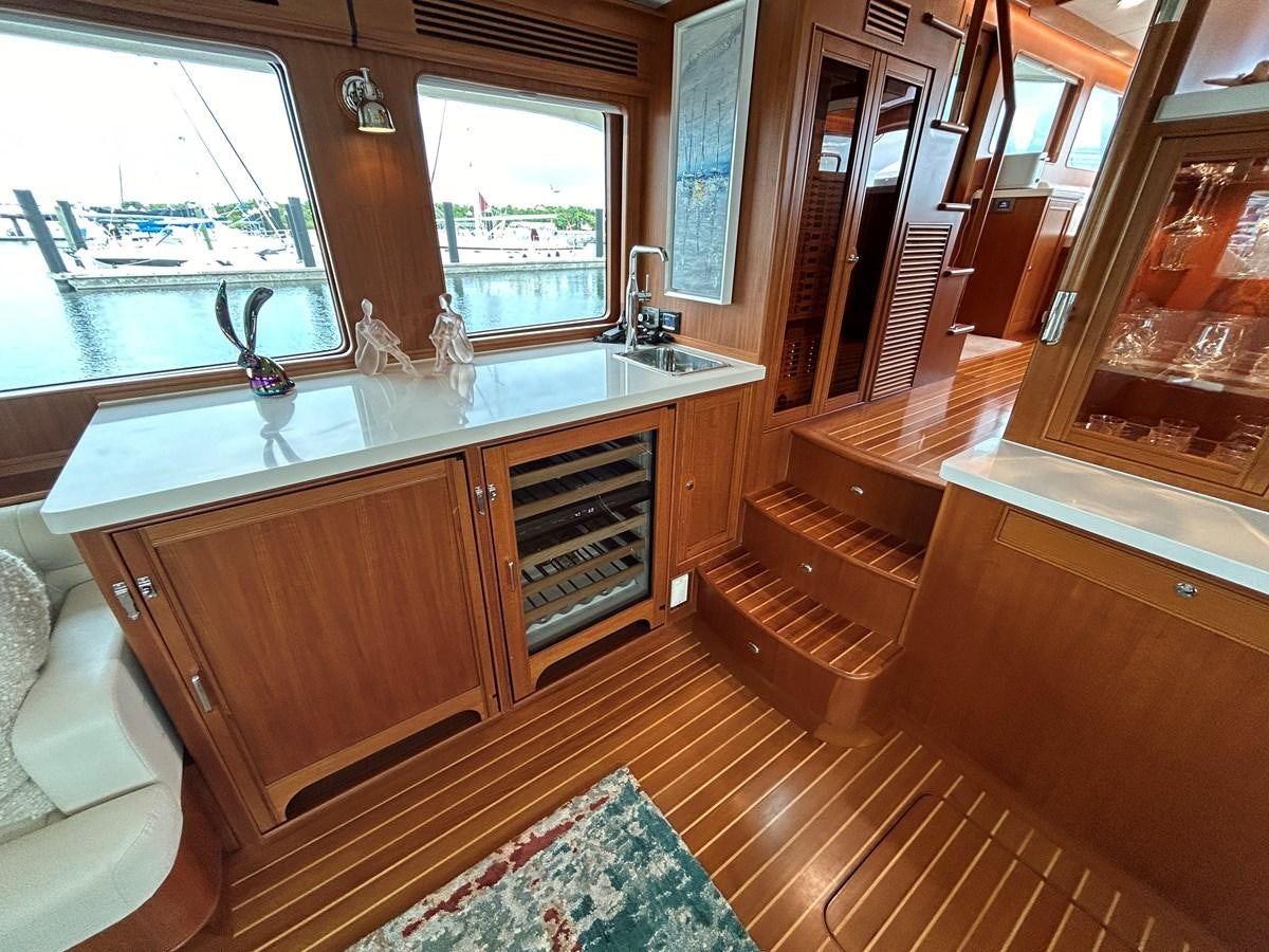 a kitchen with a large window aboard NOVIA II Yacht for Sale