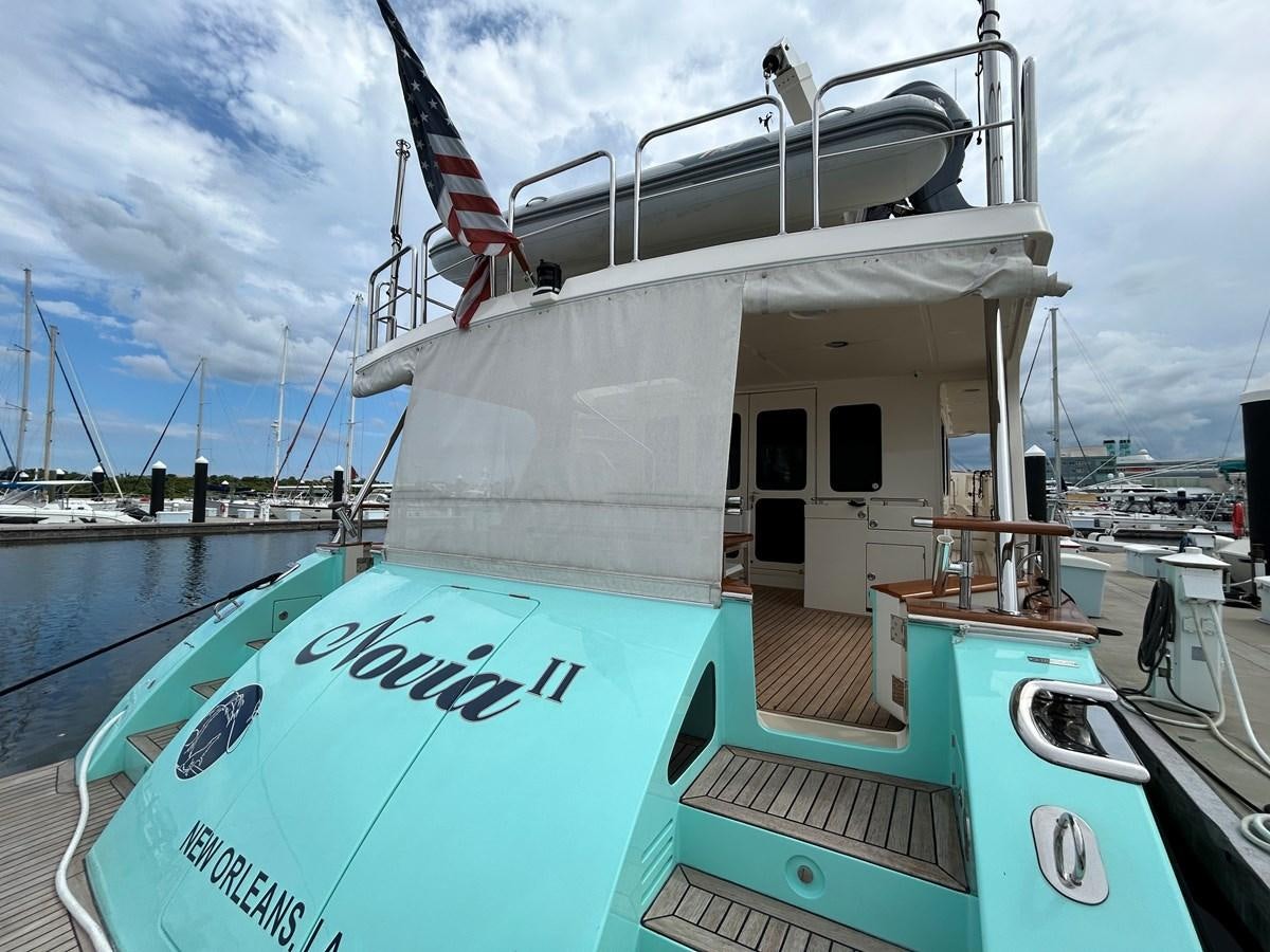 a boat docked at a pier aboard NOVIA II Yacht for Sale