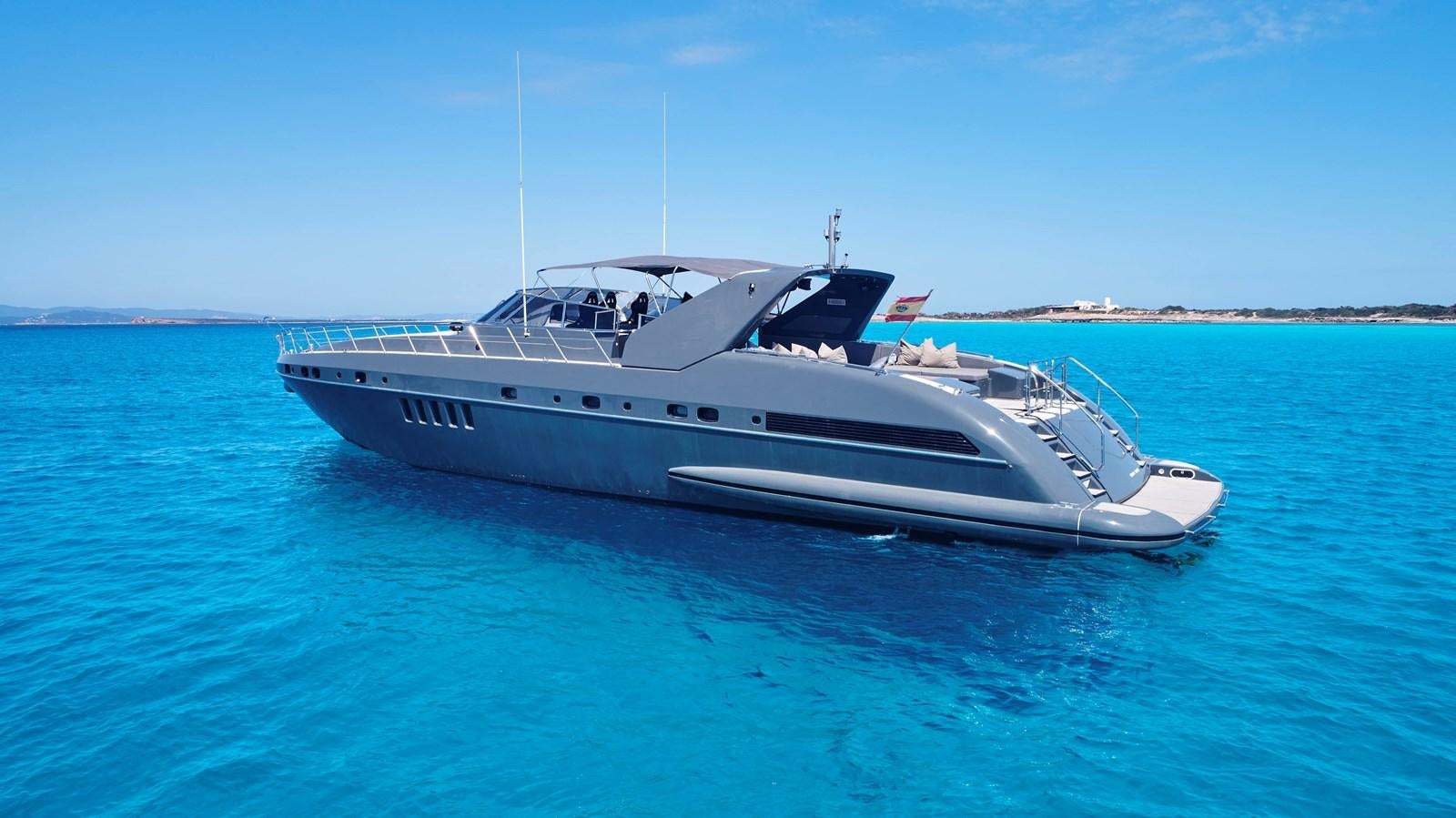 a white yacht in the water aboard INFINITY Yacht for Sale