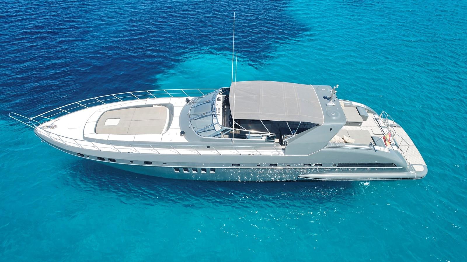 a white boat in the water aboard INFINITY Yacht for Sale
