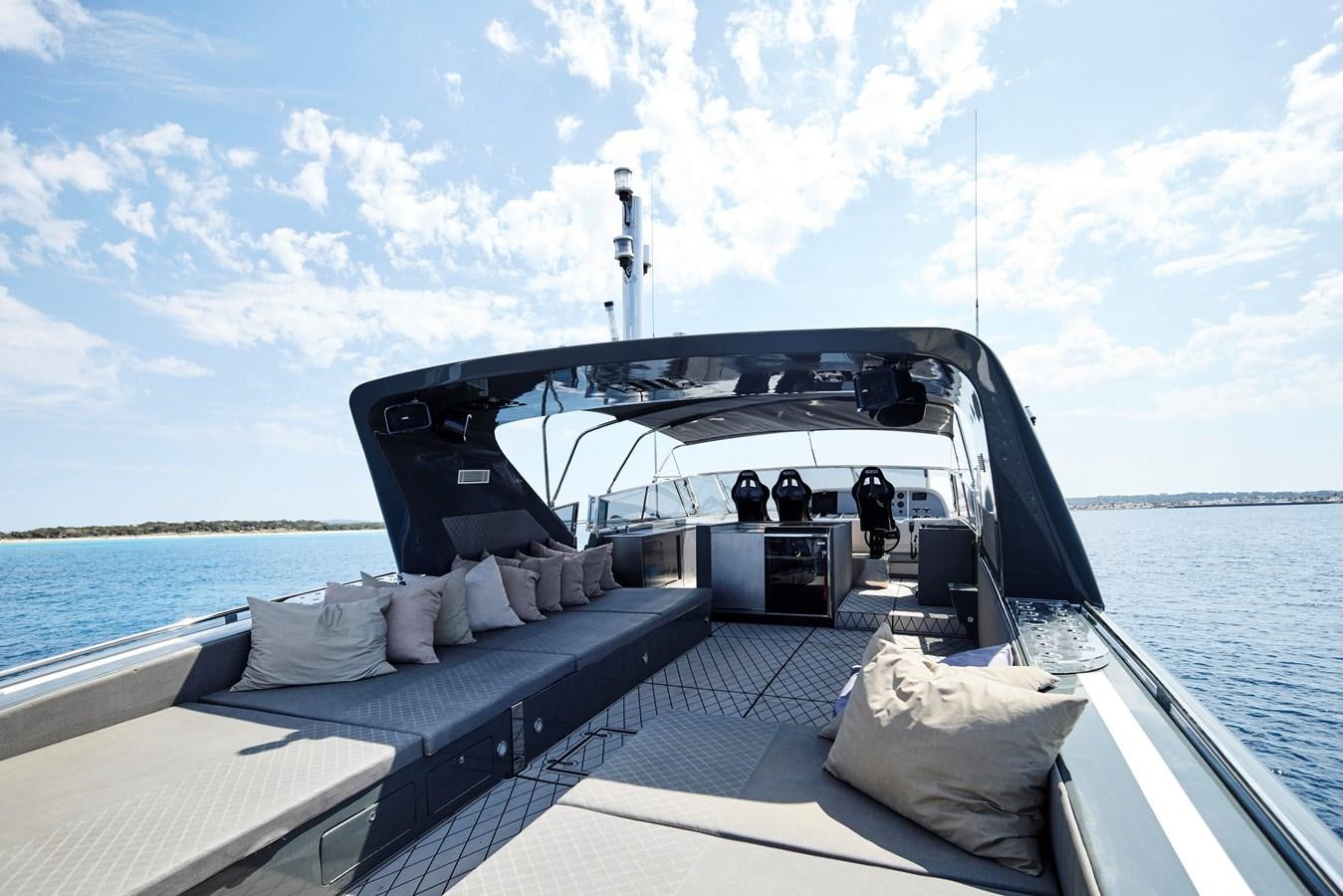 a boat with a group of people on it aboard INFINITY Yacht for Sale