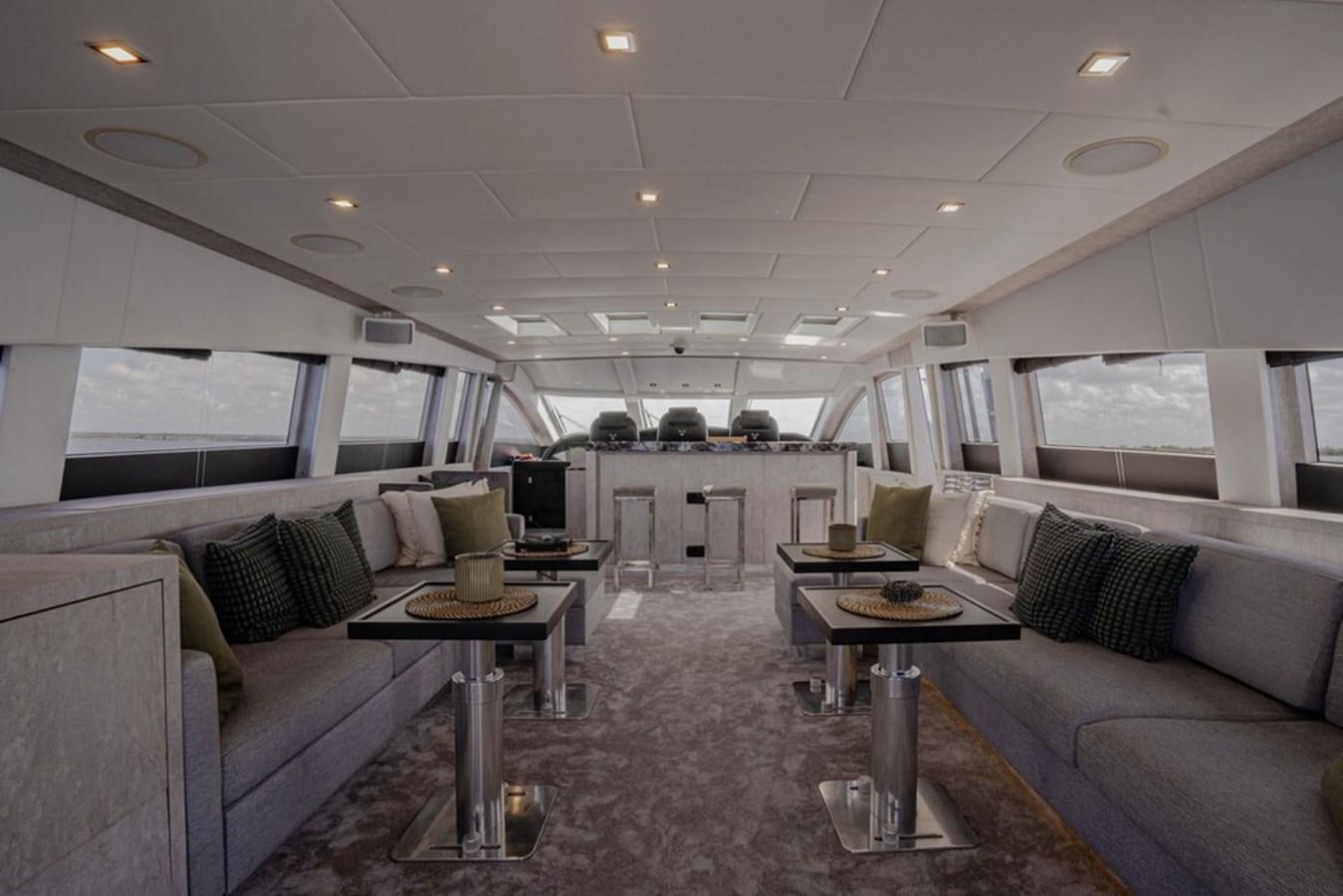a living room with a couch and a coffee table aboard LEOPARD 31 OPEN Yacht for Sale