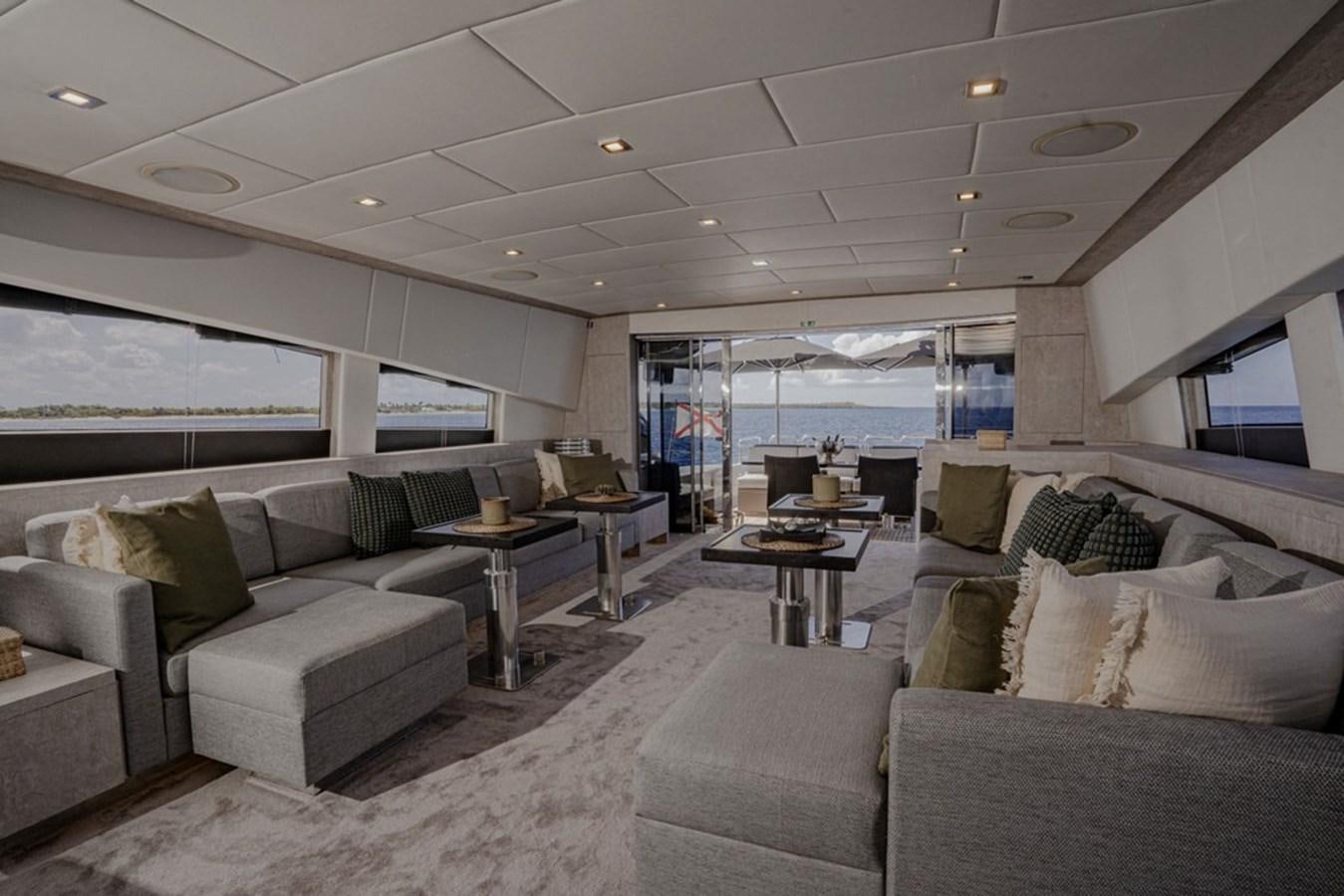 a living room with a large window aboard LEOPARD 31 OPEN Yacht for Sale
