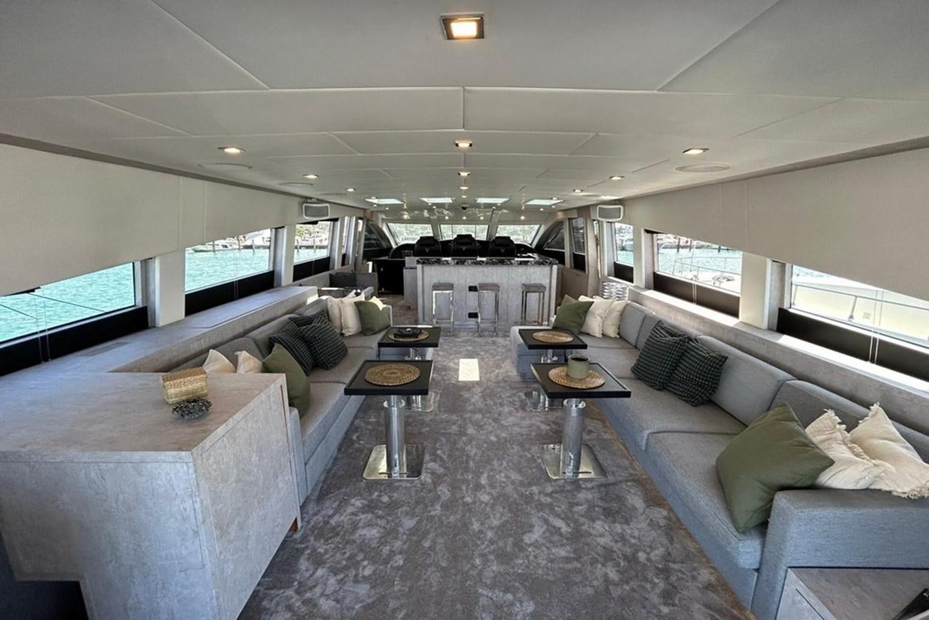 a large living room with a large screen aboard LEOPARD 31 OPEN Yacht for Sale
