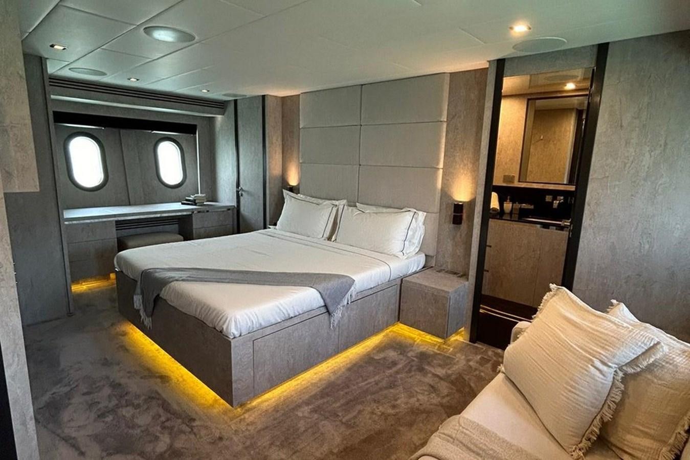 a large bed in a hotel room aboard LEOPARD 31 OPEN Yacht for Sale