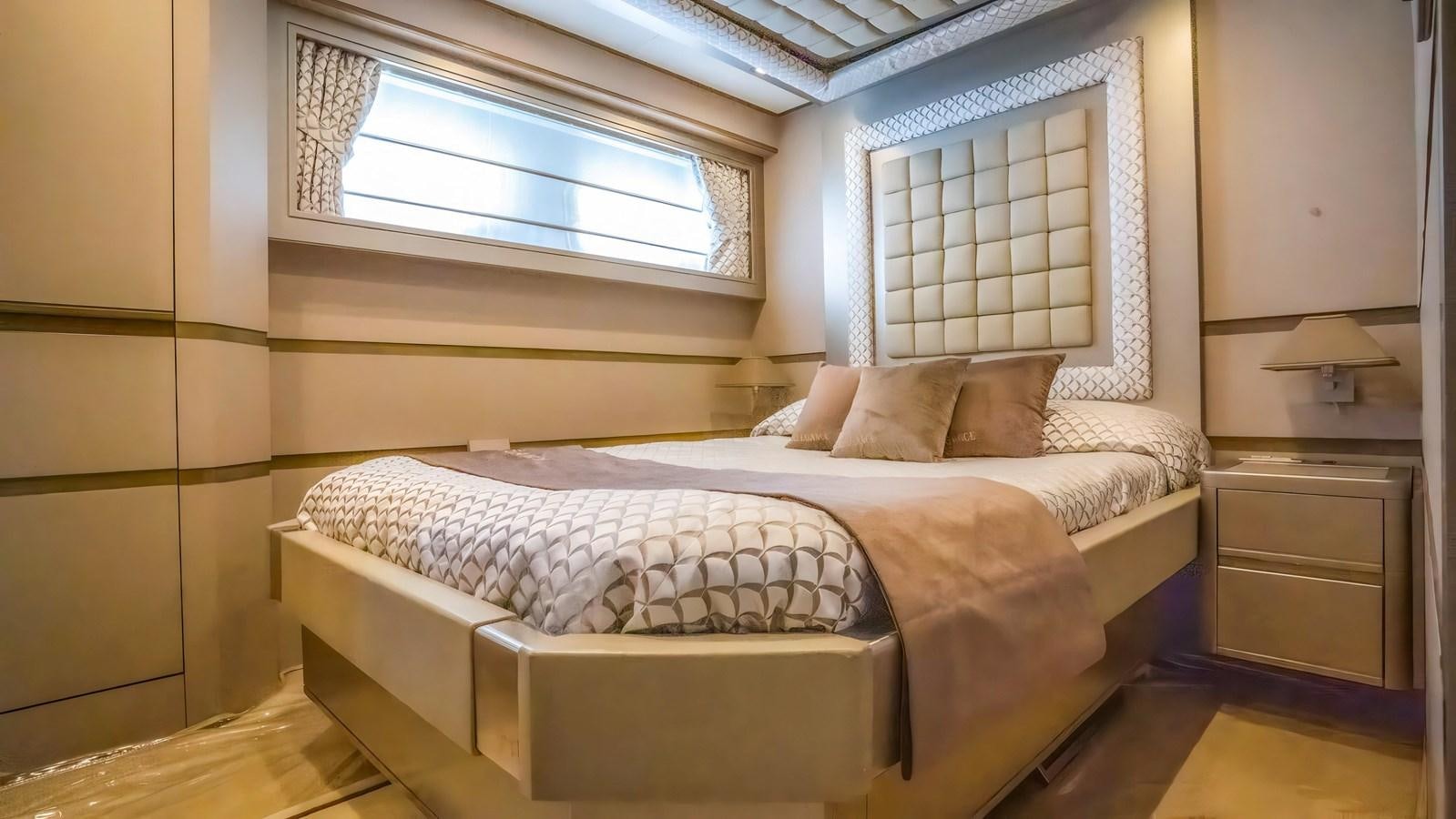 a bed in a room aboard ELEGANCE OF CANNES Yacht for Sale