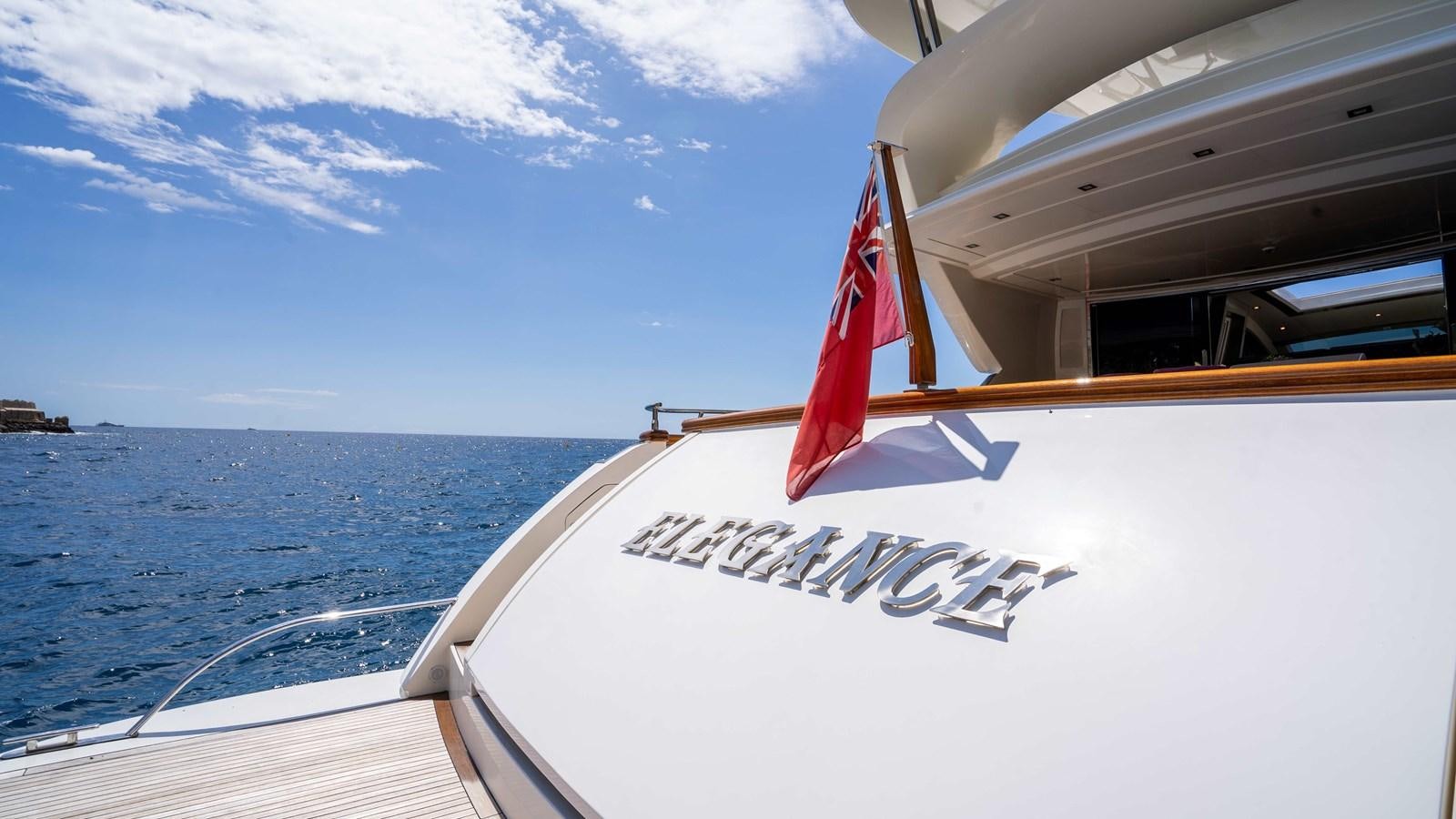 a boat with a flag on the front aboard ELEGANCE OF CANNES Yacht for Sale