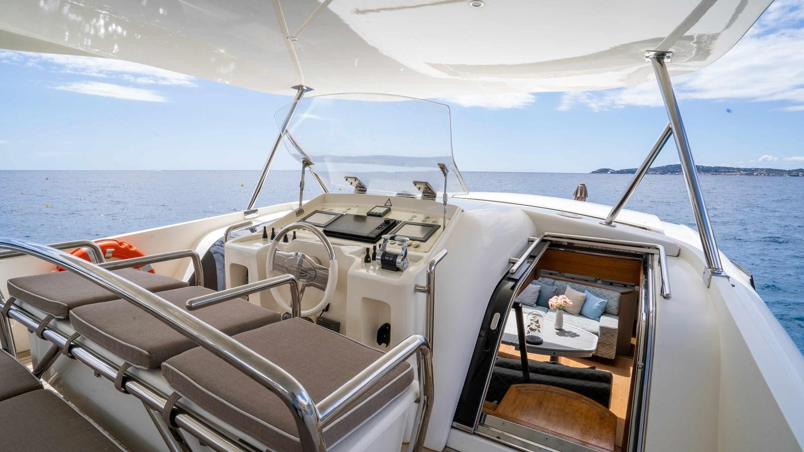 a boat with a desk on the front aboard ELEGANCE OF CANNES Yacht for Sale