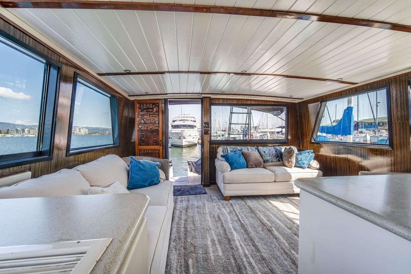 a room with a bed and a couch aboard SEA WOLF Yacht for Sale