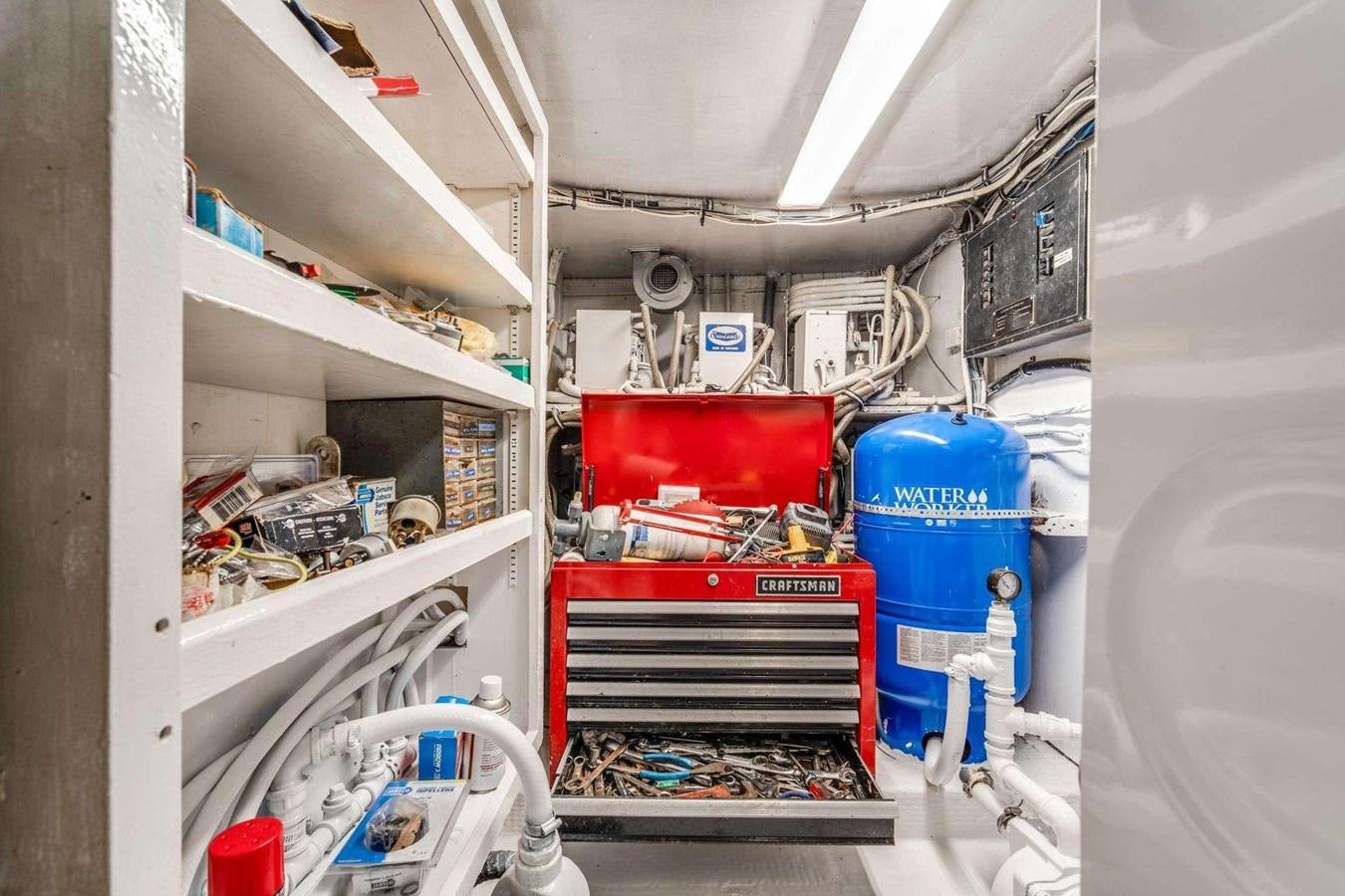 a room with shelves and equipment aboard SEA WOLF Yacht for Sale