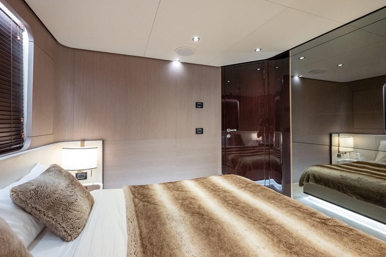 a hotel room with a bed aboard CLOUDY BAY Yacht for Sale