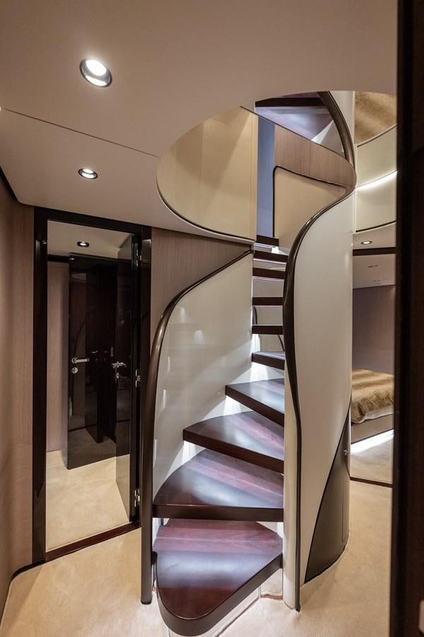 a set of stairs in a room aboard CLOUDY BAY Yacht for Sale
