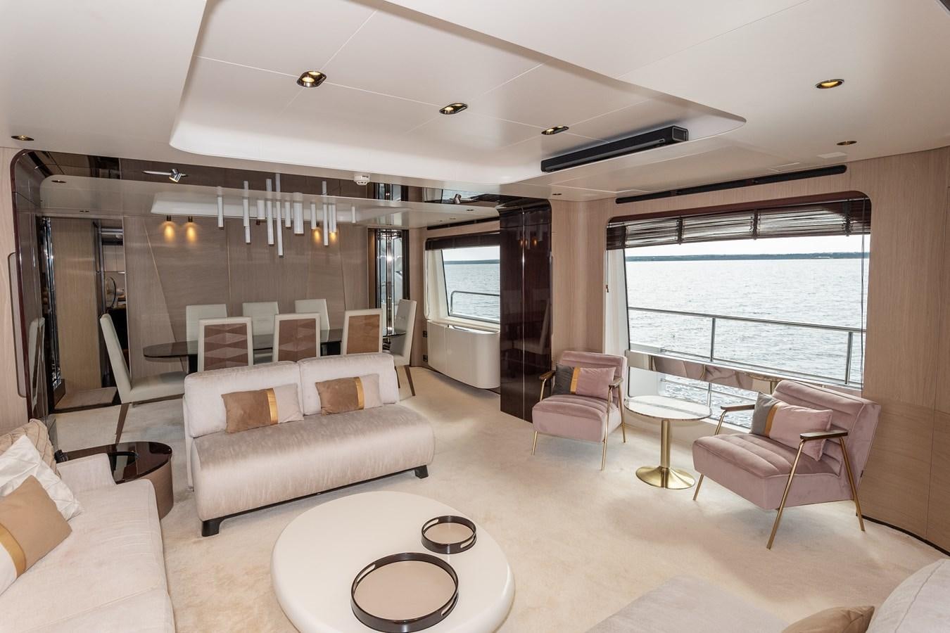 a living room with a large window aboard CLOUDY BAY Yacht for Sale