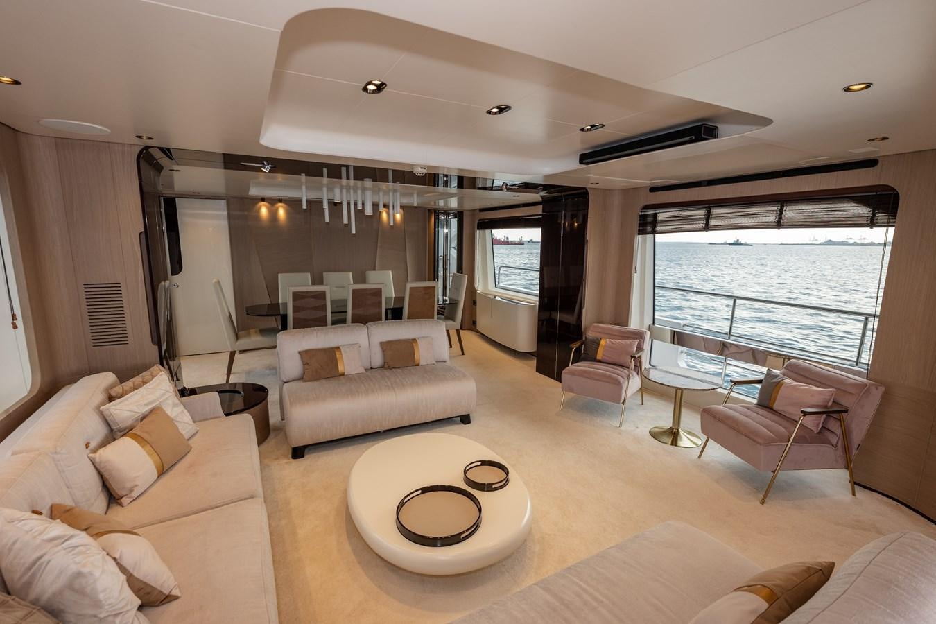 a living room with a large window aboard CLOUDY BAY Yacht for Sale
