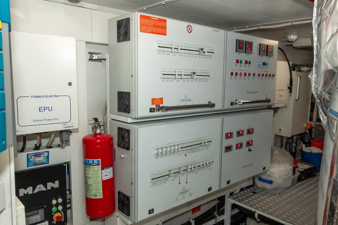 a machine with a red label aboard CLOUDY BAY Yacht for Sale