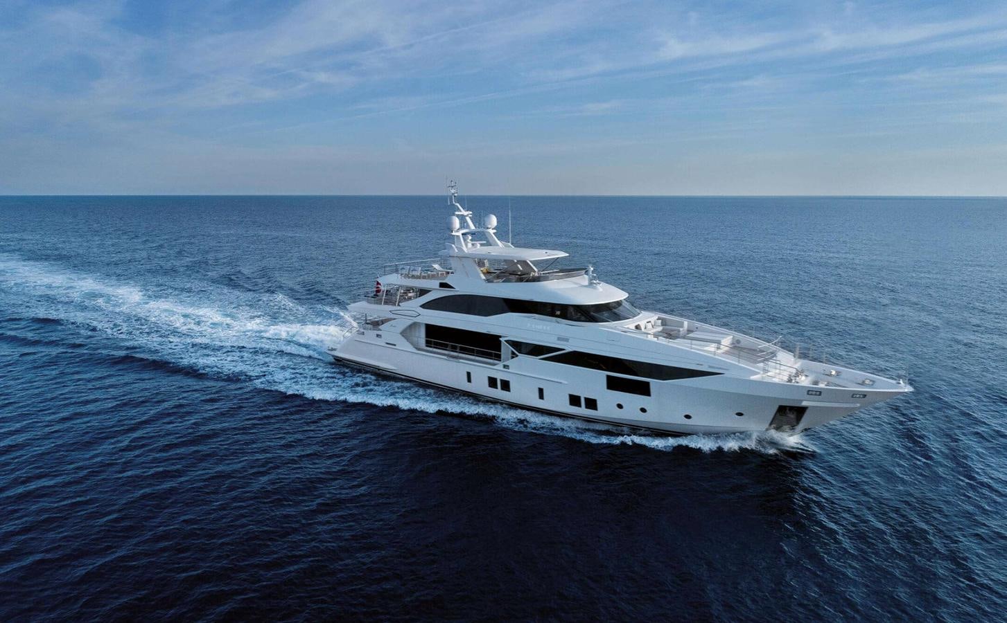 a white yacht in the water aboard BAMBOO Yacht for Sale