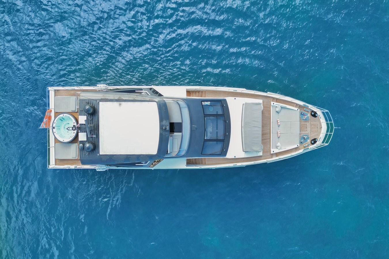 a boat in the water aboard ENCHANTE Yacht for Sale