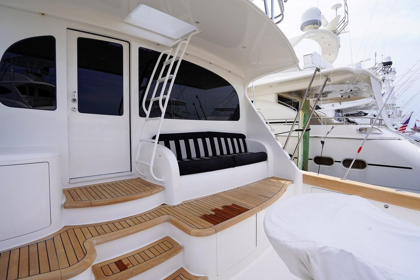 a white boat with a white door aboard BENEDETTA Yacht for Sale