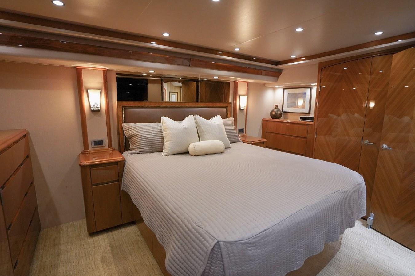 a bed with white sheets aboard BENEDETTA Yacht for Sale