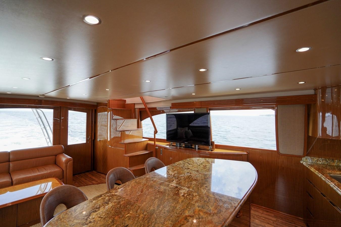 a dining room with a large table aboard BENEDETTA Yacht for Sale