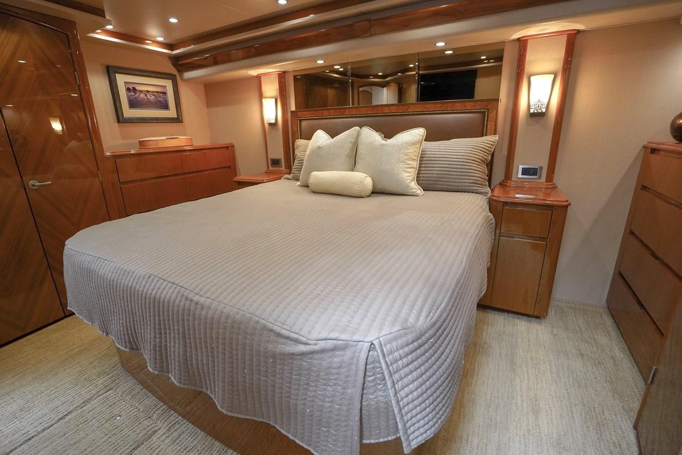 a bed with white sheets aboard BENEDETTA Yacht for Sale